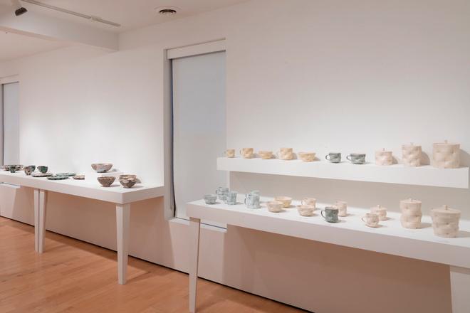 empty gallery space with pottery all displayed