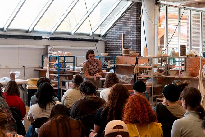 Rebecca Chappell giving a demonstration with an audience